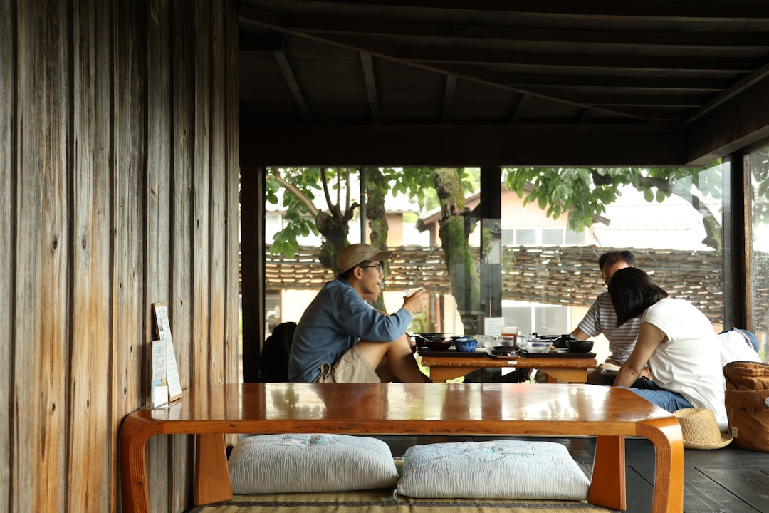 Family gathered around a table enjoying a game night together