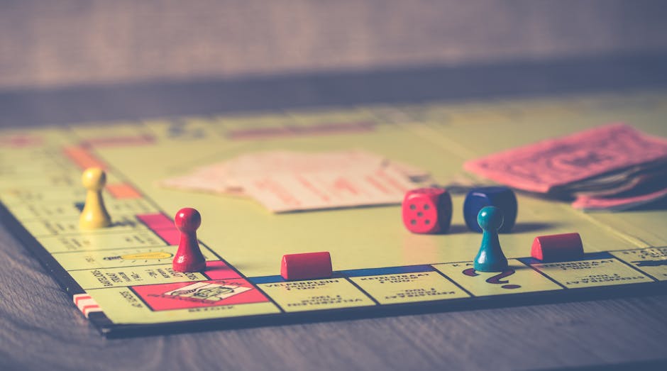 Family gathered around board game table during bank holiday weekend, enjoying strategic gameplay and friendly competition