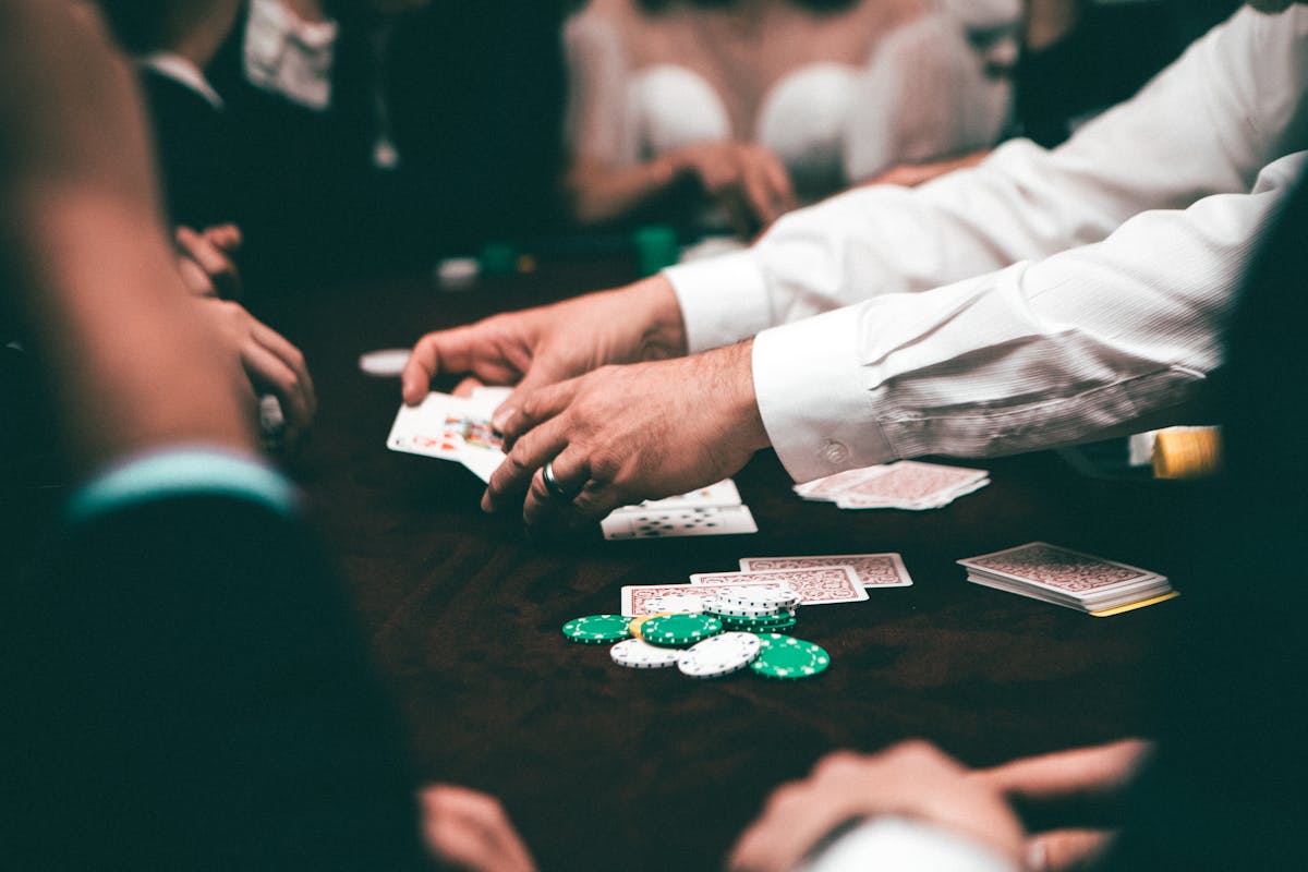 Group of players engaged in negotiation and bluffing gameplay