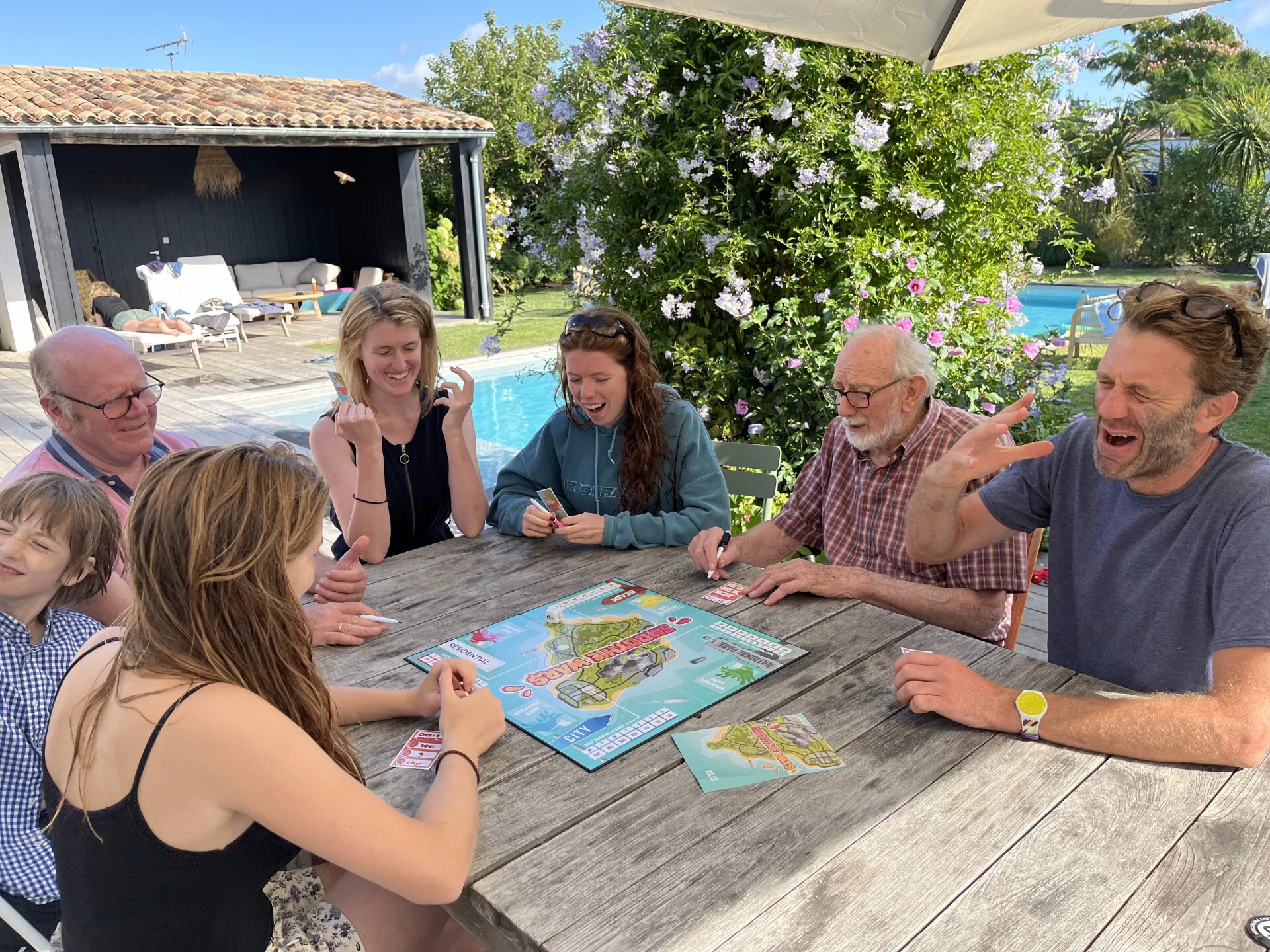Smoothie Wars board game being played by a family